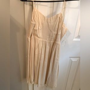 Cream Colored mini dress with bustier style top with stretchy back & tie straps